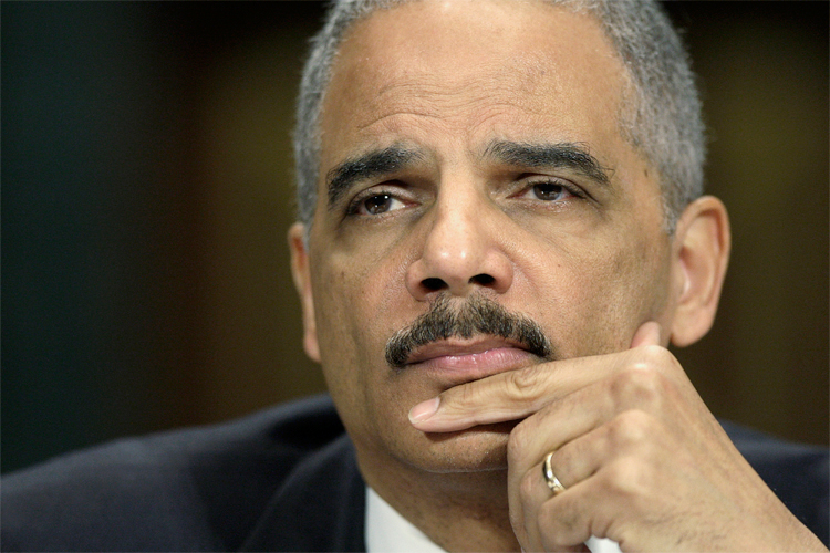 U.S. Attorney General Eric Holder listens to a question at a hearing of the Senate Judiciary Committee on Capitol Hill in Washington